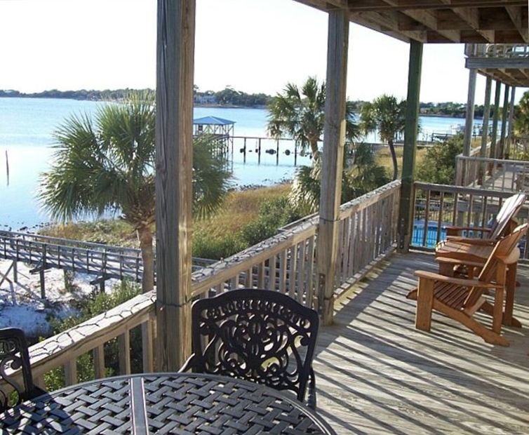 View of outdoor eating and sitting area on 30 ft. private covered balcony.